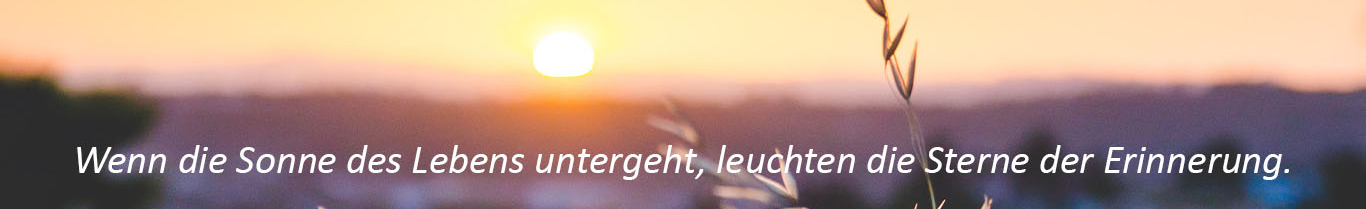 Sonnenuntergang mit folgenden Spruch: Wenn die Sonne des Lebens untergeht, leuchten die Sterne der Erinnerung.